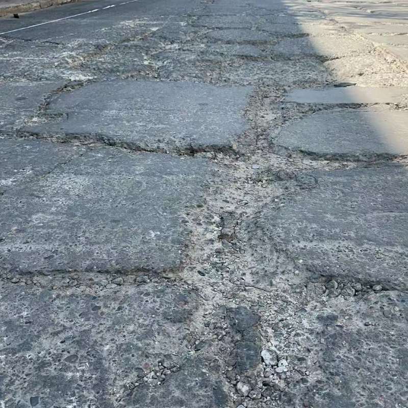 霞山路面起砂露石子修补料